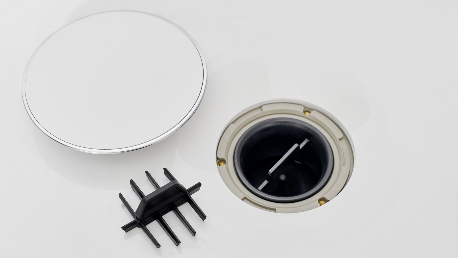 Noteces vāciņš un ķemmveida ieliktnis Noteces vāciņš un ķemmveida ieliktnis