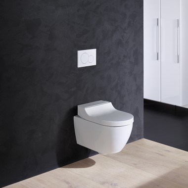Geberit AquaClean Tuma bidē tualetes pods ar baltu vāku Geberit AquaClean Tuma bidē tualetes pods ar baltu vāku