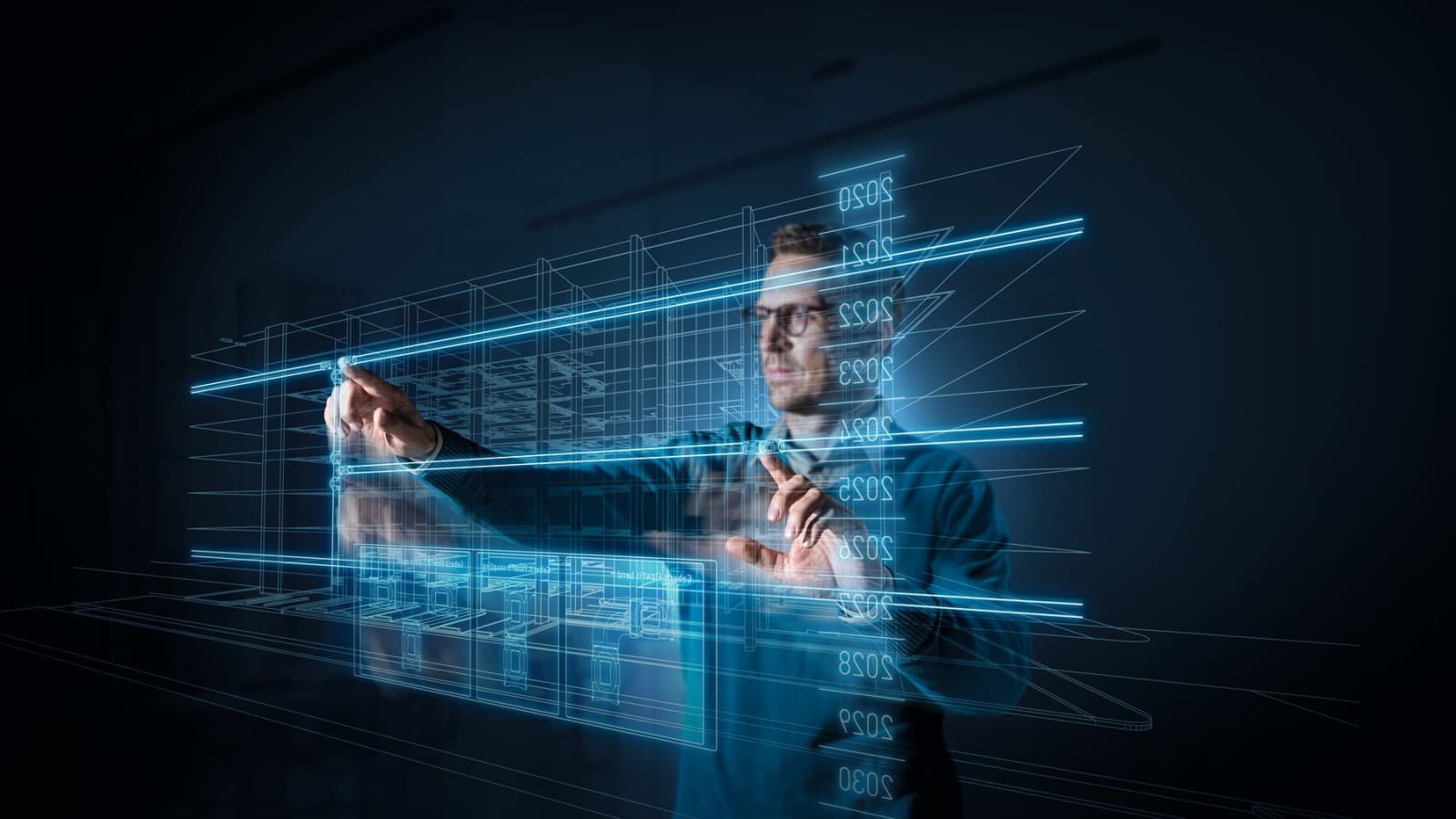 Plānotājs ekrāna priekšā Plānotājs ekrāna priekšā